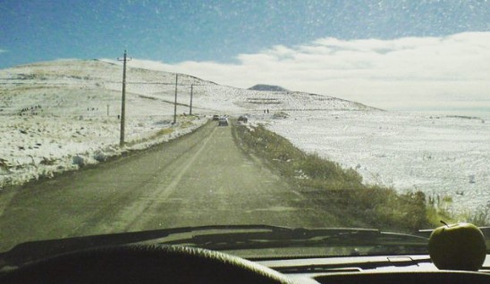View from inside a car on a snowy road