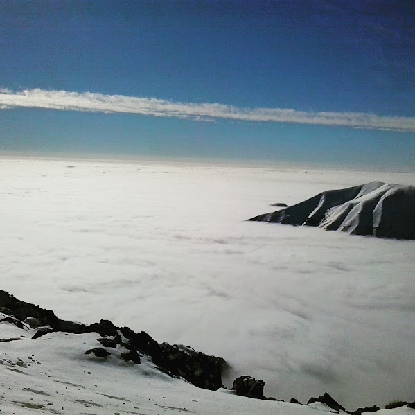 Mountain peak above the clouds